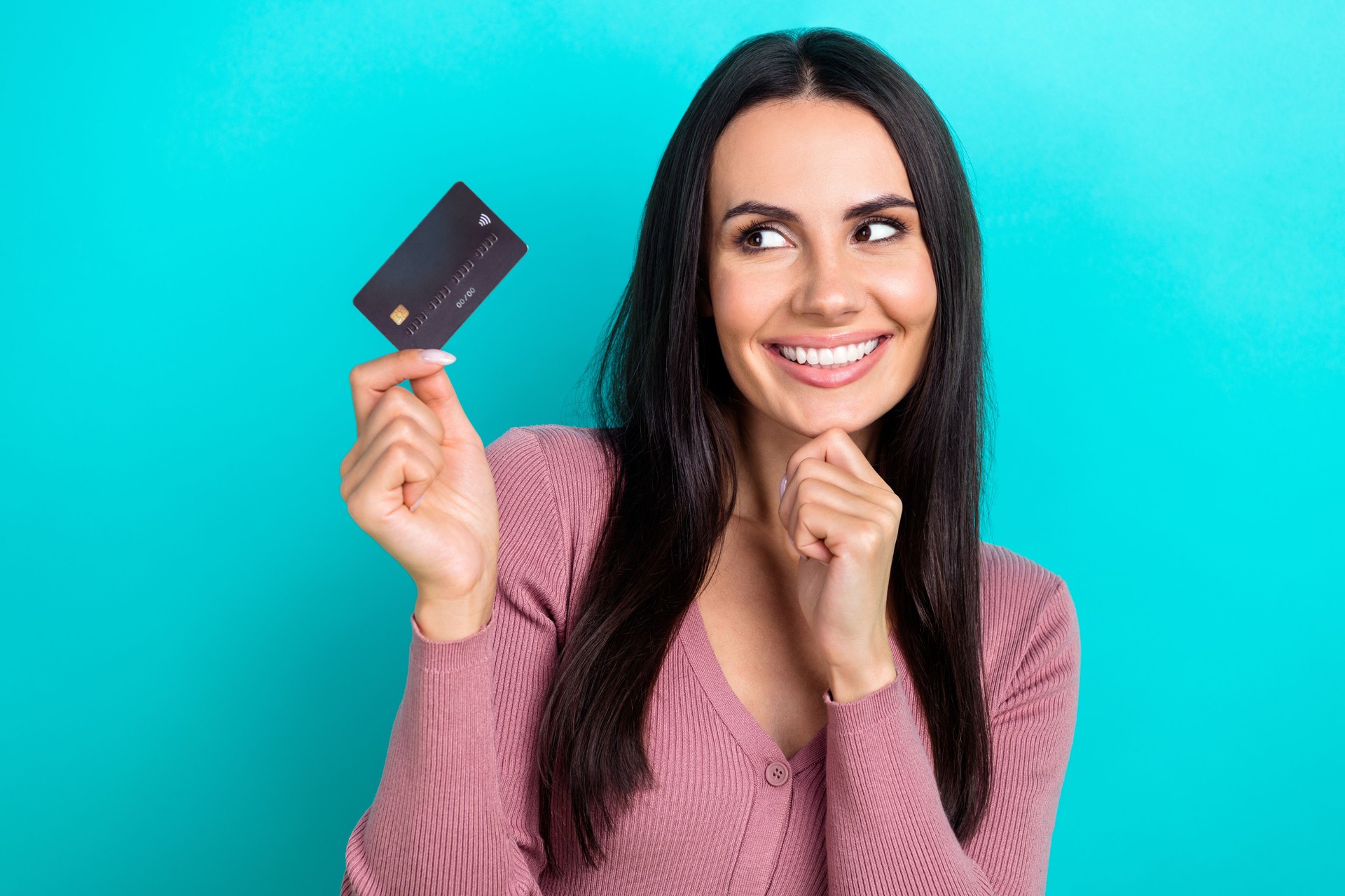 Portrait photo of young promoter optimistic woman smile visa mastercard debit card new terms high percent cashback isolated on blue color background
